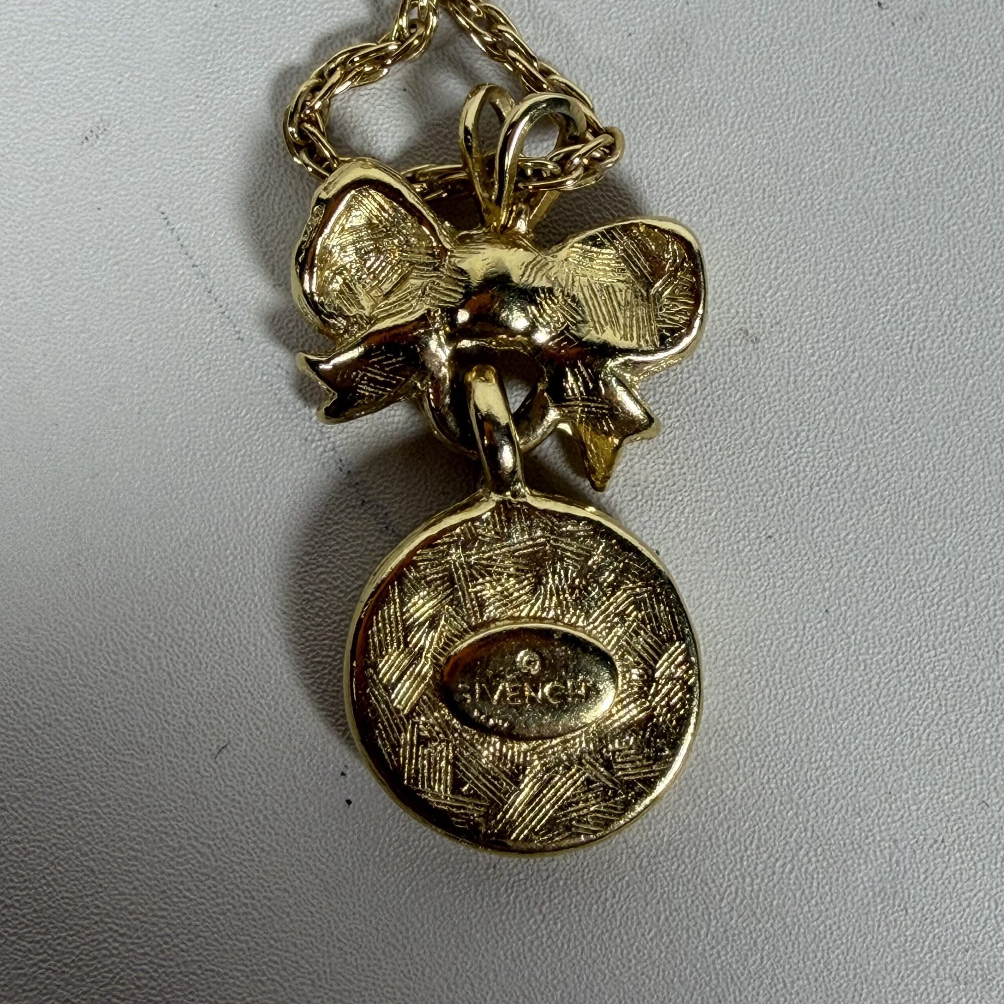 Vintage Givenchy Gold Tone Bow & 4G Logo Circle Pendant Necklace