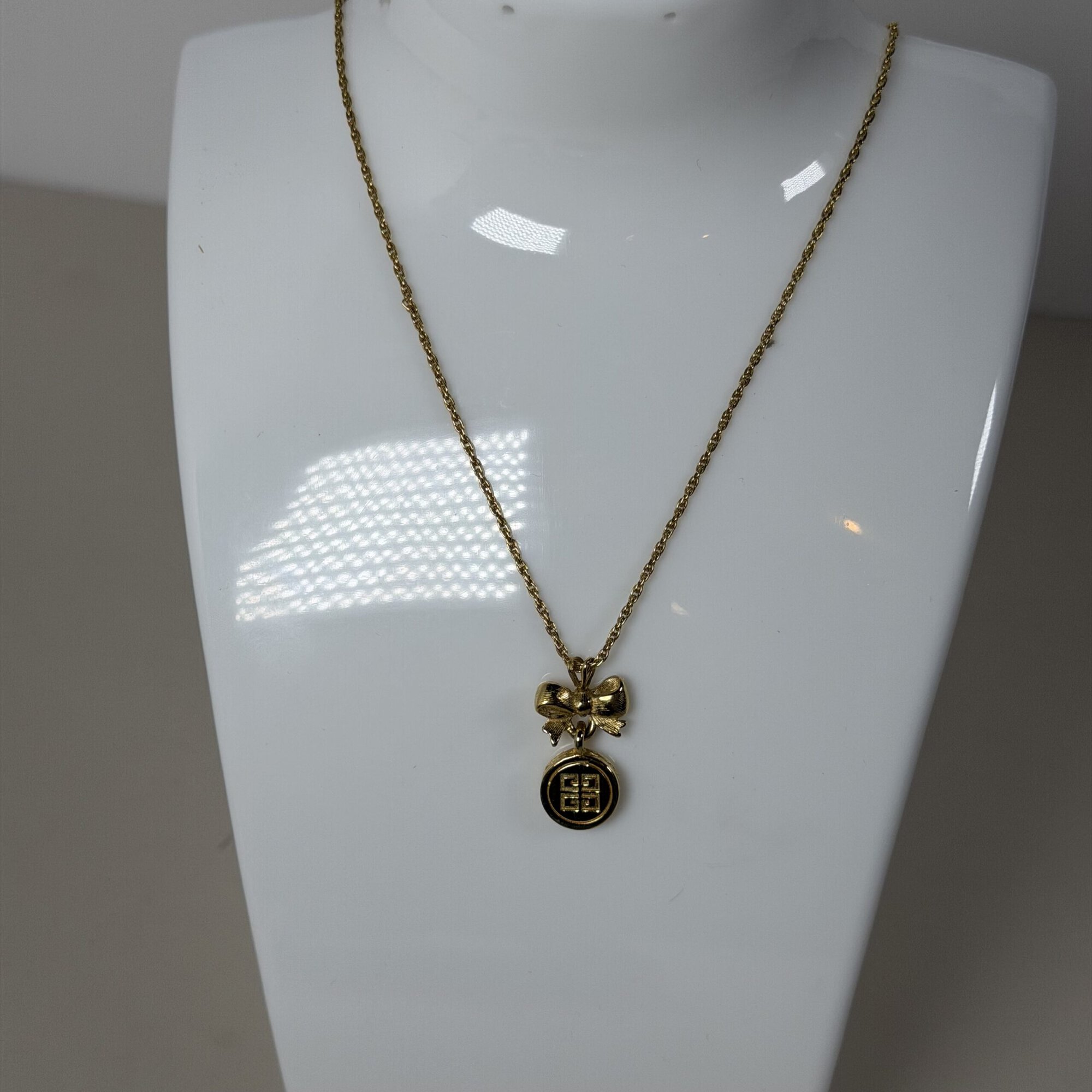 Vintage Givenchy Gold Tone Bow & 4G Logo Circle Pendant Necklace