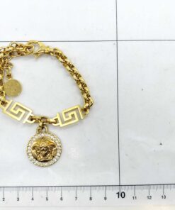 Versace Gold-Tone Greca Key Pavé Crystal Medusa Head Pendant Charm Bracelet - Image 8