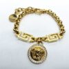 Versace Gold-Tone Greca Key Pavé Crystal Medusa Head Pendant Charm Bracelet