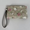 Corner Zip Wristlet in Signature Canvas with Prairie Rose Print