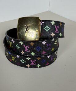 Coiled Louis Vuitton Monogram Multicolore belt showing gold-tone cutout LV buckle and black strap.