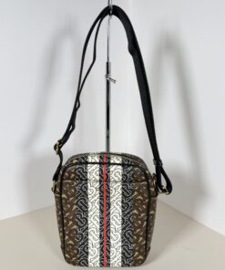 Burberry Monogram Stripe crossbody bag displayed on a stand from the front