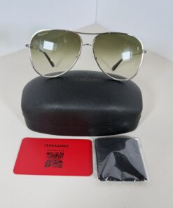 Ferragamo SF268S sunglasses shown with Ferragamo case, wrapped cleaning cloth, and brand card