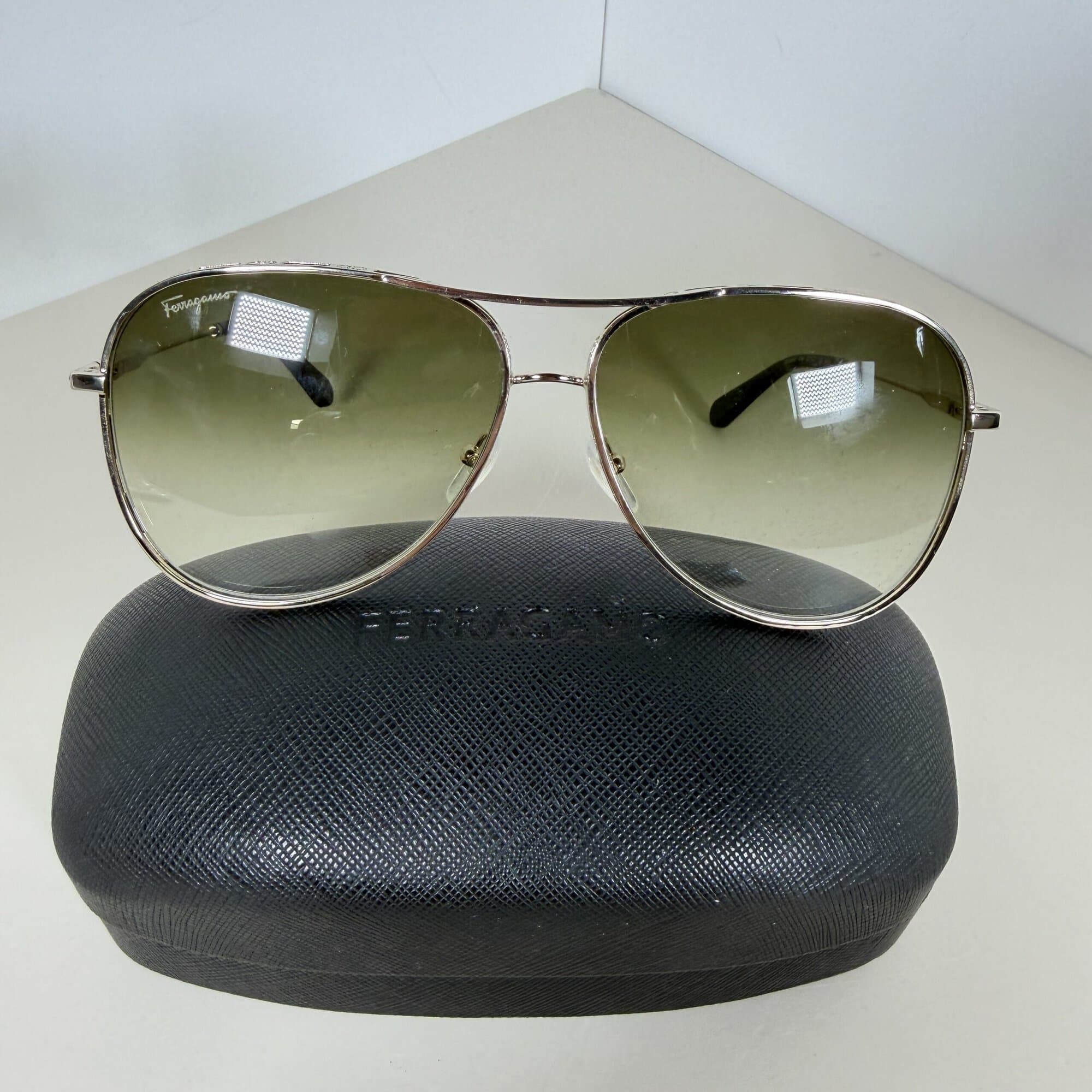 Ferragamo SF268S crystal aviator sunglasses with green gradient lenses on black hard case