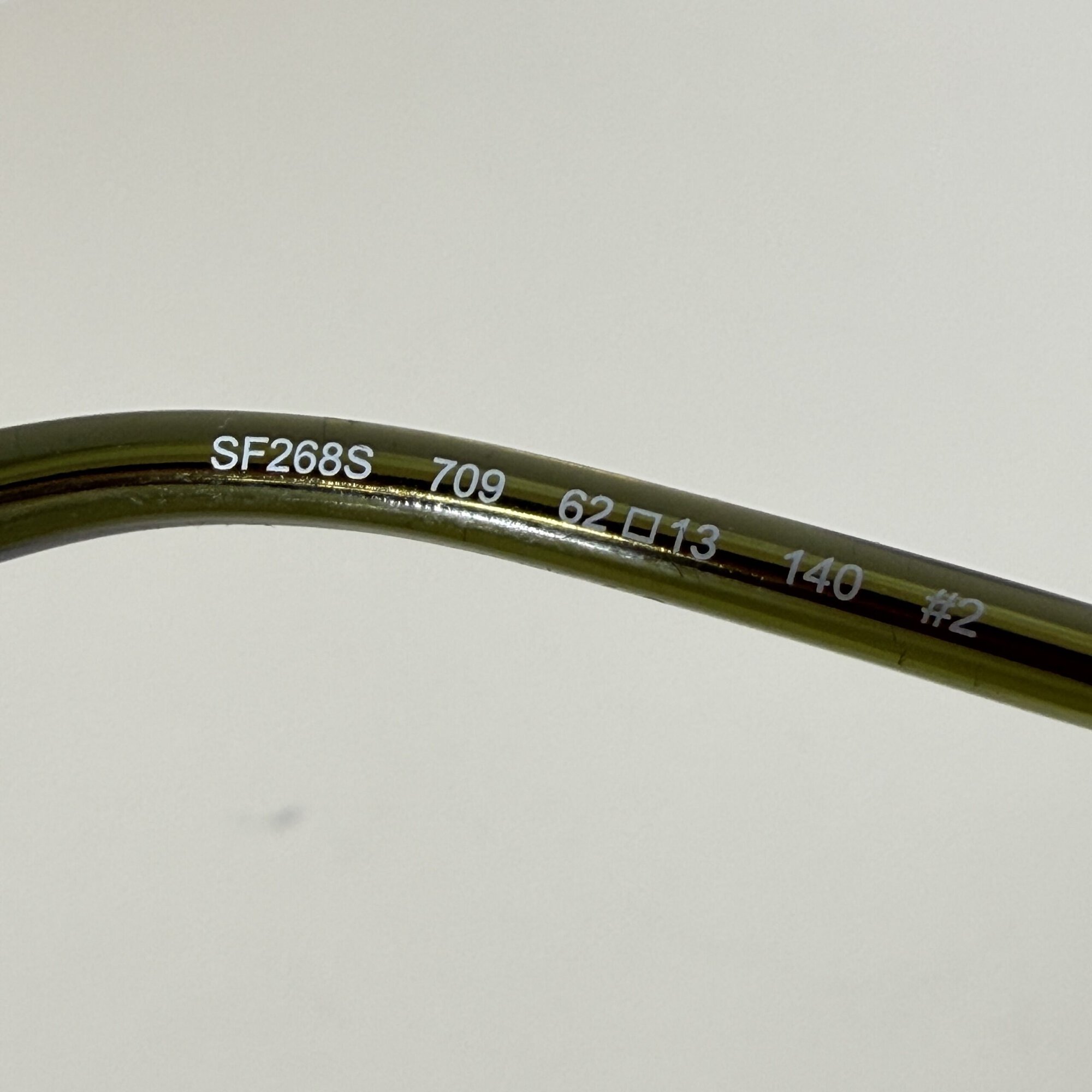 Inner temple arm marking SF268S 709 62 13 140 #2 on Ferragamo sunglasses